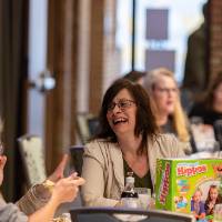 people talking at luncheon tables photo 3